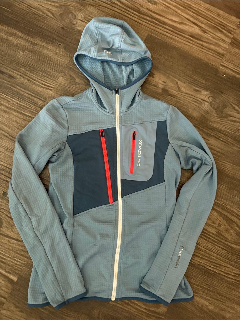 Ortovox Women's Light Blue Hooded Puffer-Style Softshell Jacket with Navy Panels